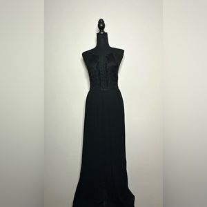 Long black dress. New never been worn but it is missing the tag.